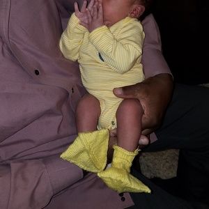 Knitted duck baby booties/ new ones not my baby's!